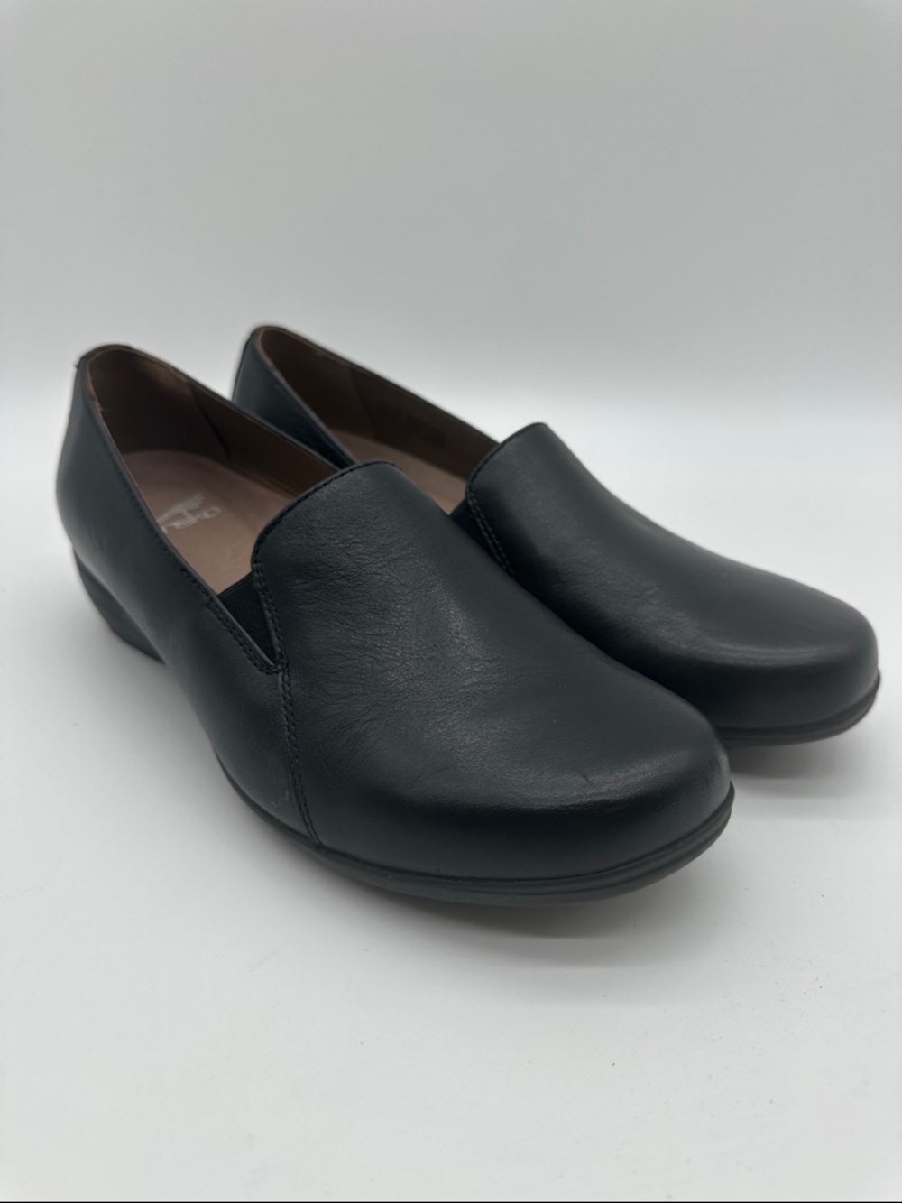 Dansko Black Leather Slip-On Flats